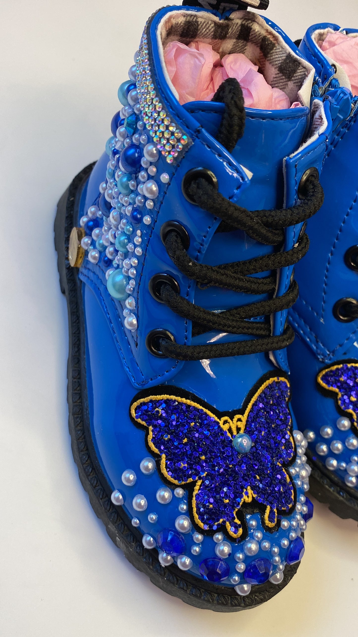 THE BLUE BUTTERFLY ON BLUE BOOTS